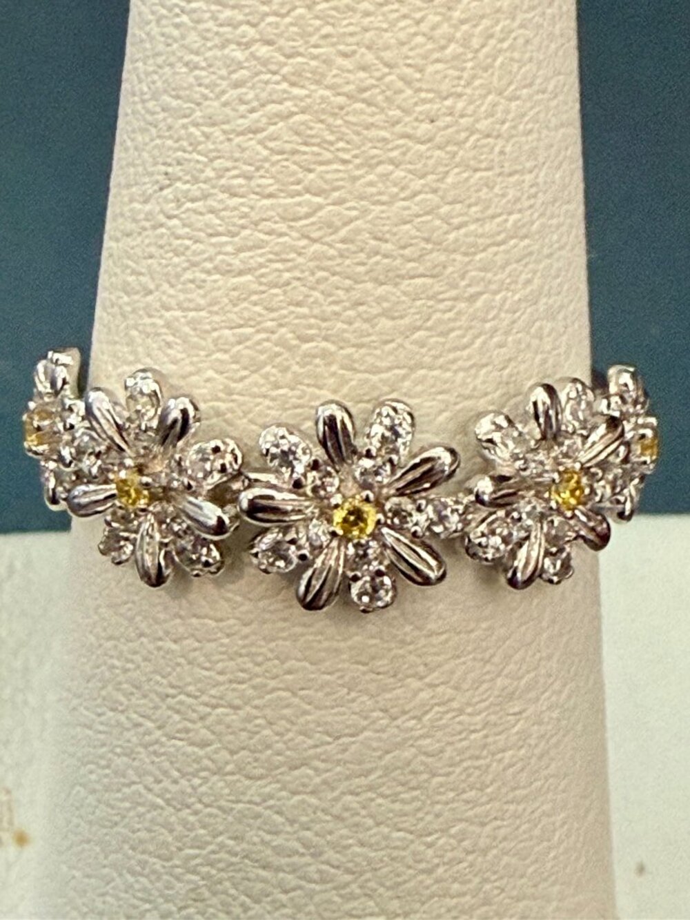 Fado sterling silver daisy chain ring with cubic zirconia stones